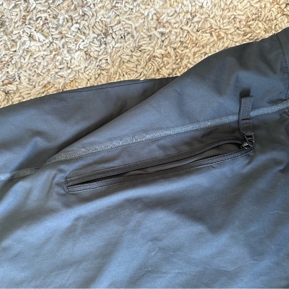 Nike Golf DriFit Quarter-zip Pullover. Black, water resistant material. - Picture 6 of 7